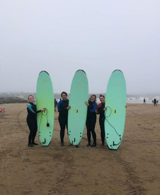 Surfing in Lahinch with Ireland Chauffeur Travel